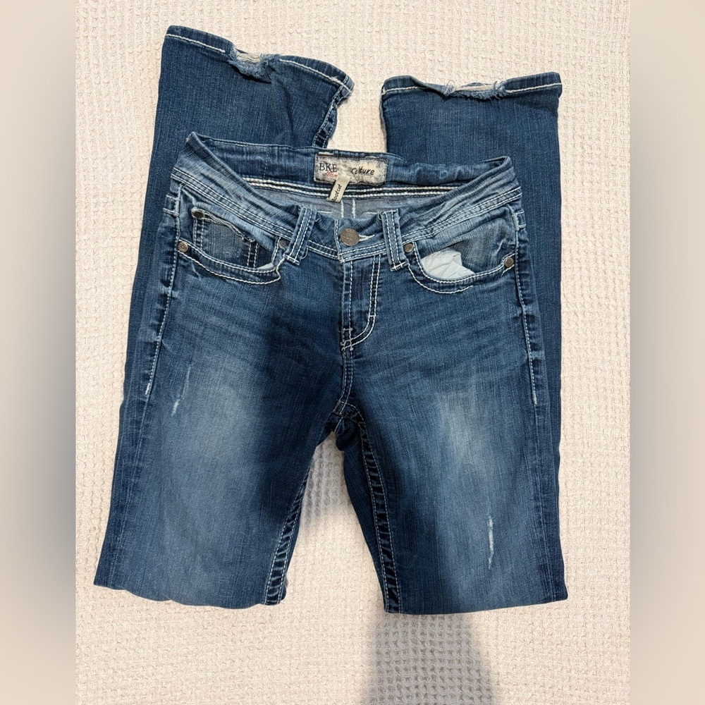 BKE Kulture mid-rise dark wash bootcut jeans with embellished back pockets